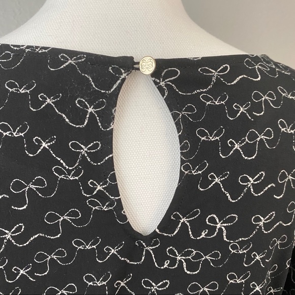 CeCe Danity Tiered Ruffled Bell Sleeve Bow Blouse - Picture 8 of 11